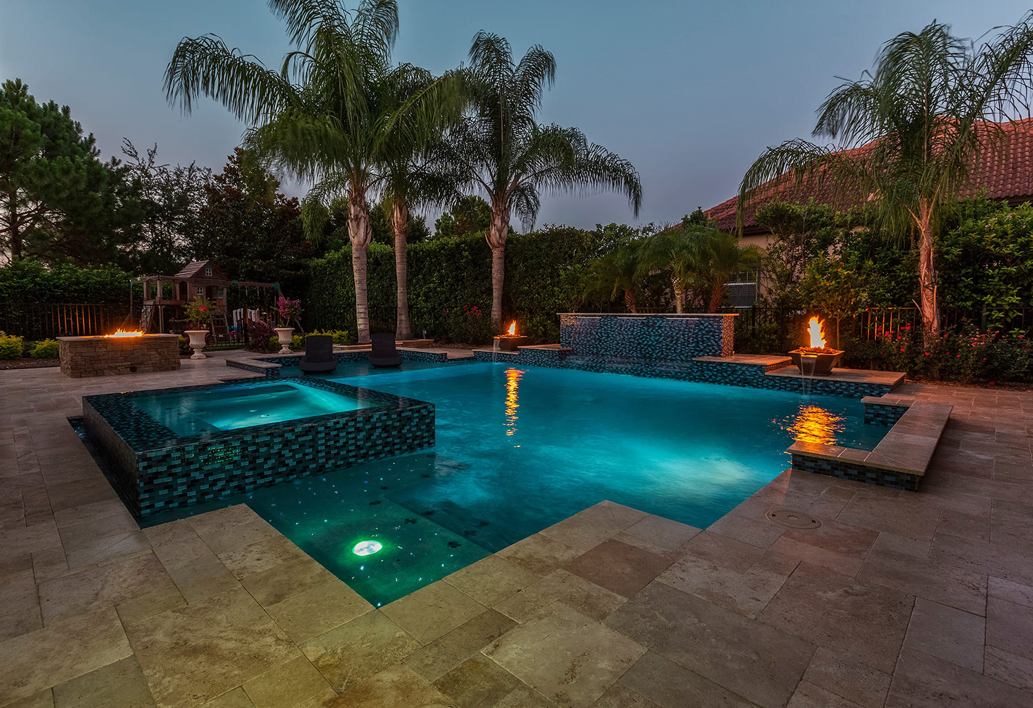 a pool and spa at night in Tampa